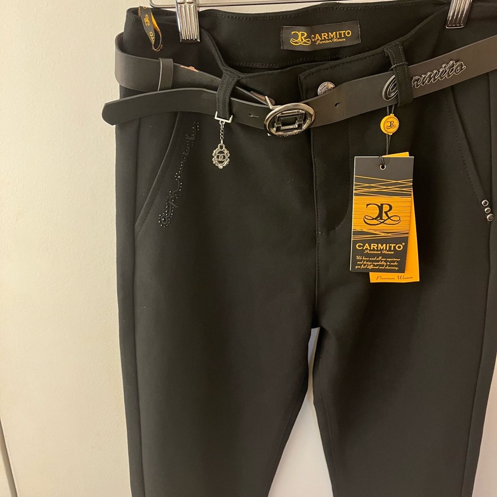 This is a brand new women’s pair of ￼CARMITO dress pants! New with tags!